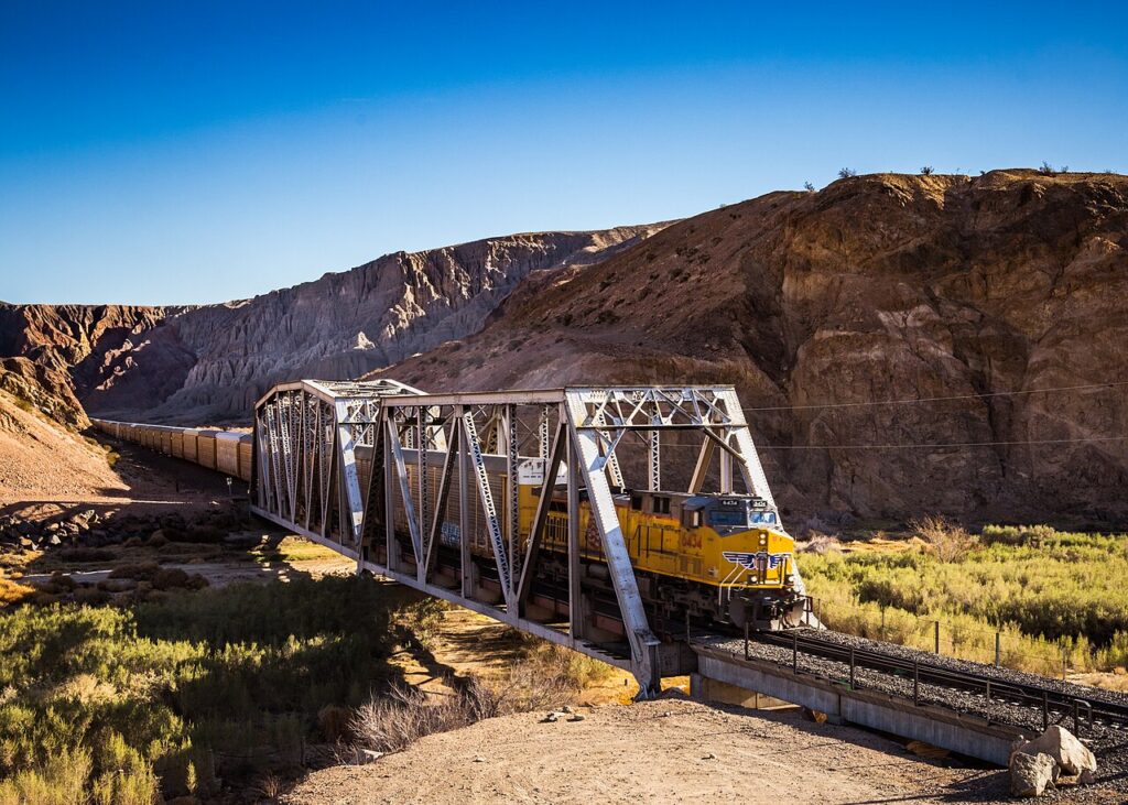 Train traveling across rail bridge